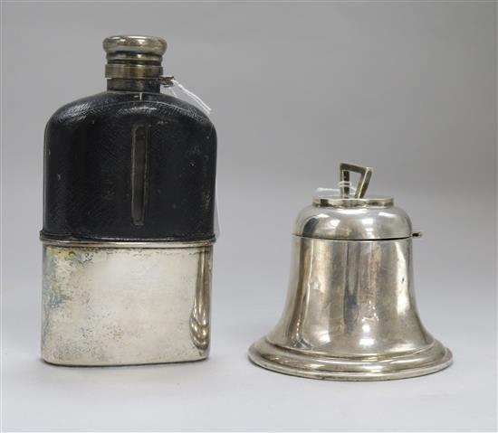 A silver bell-shaped inkwell and a leather and plate hip flask with silver top